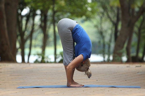 Hastapadasana-increase-height-with-yoga-2